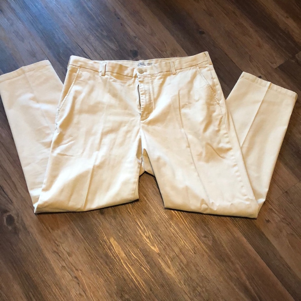 IZod 38x32 Classic light Tan Chinos. Cuffs fit over boots